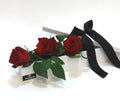 3 red roses in a long gift box